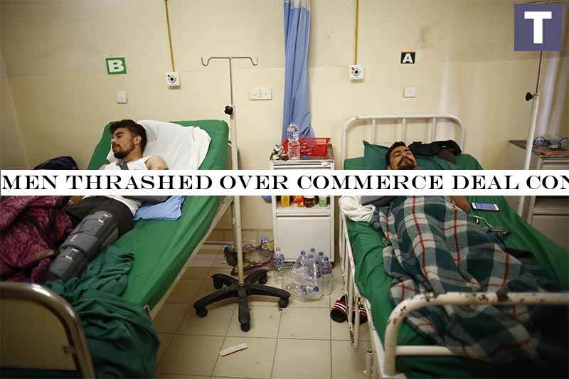 Men thrashed over commerce deal confessted to hospital