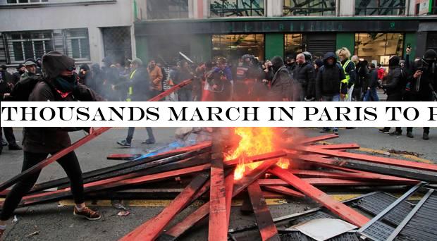 Thousands march in Paris to protest over pension reform plan