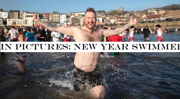 In Pictures: New Year swimmers take the plunge