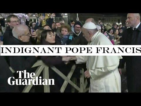 Indignant Pope Francis slaps woman's hand to free himself at New Year's Eve gathering