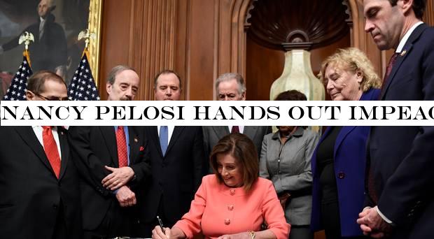 Nancy Pelosi hands out impeachment pens after signing articles