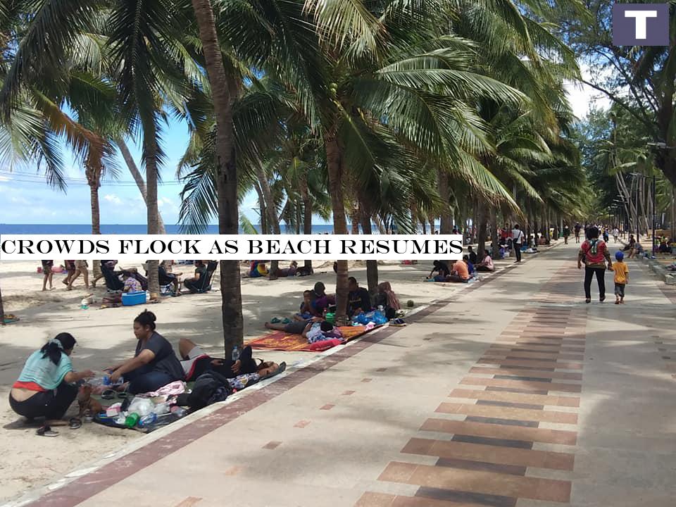 Crowds flock as beach reopens